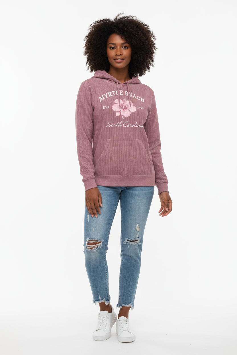 Dark skin female model in rose pink Myrtle Beach hoodie full-length