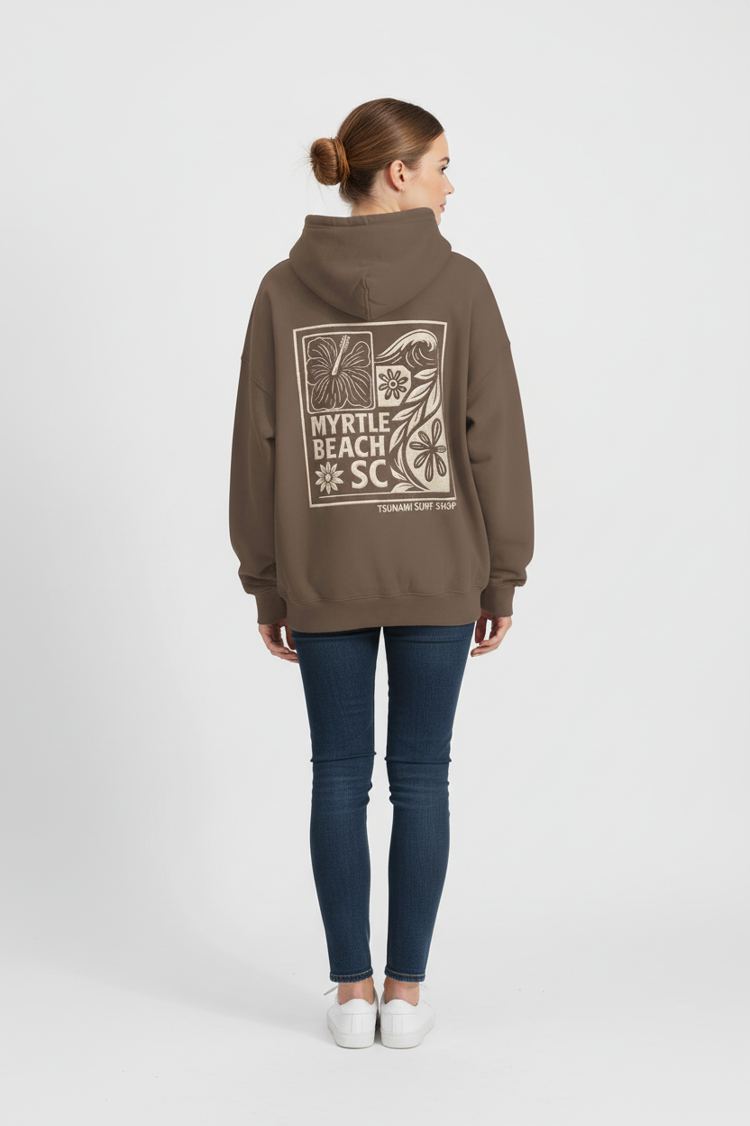 Full-length back view of Myrtle Beach SC cinder hoodie on female model