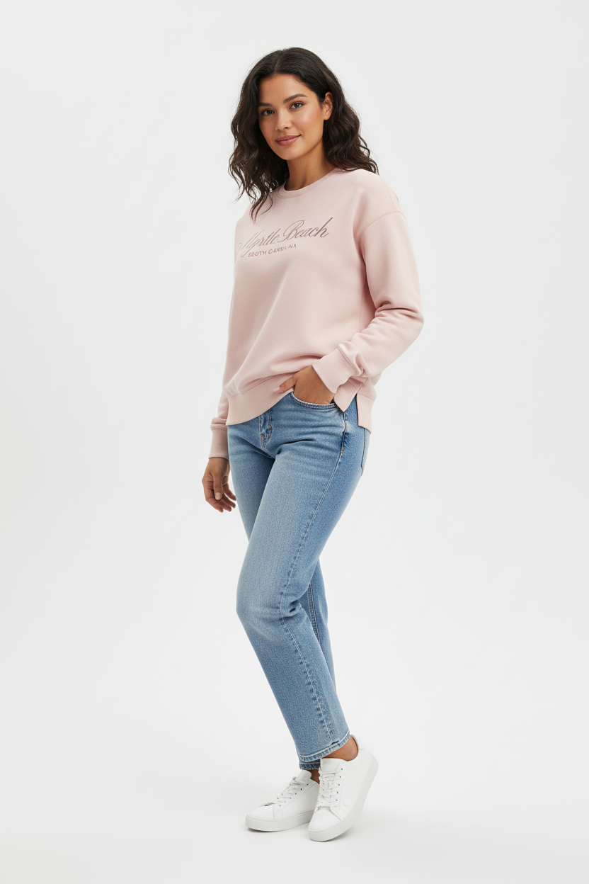 Latina model in blush crewneck front-left view