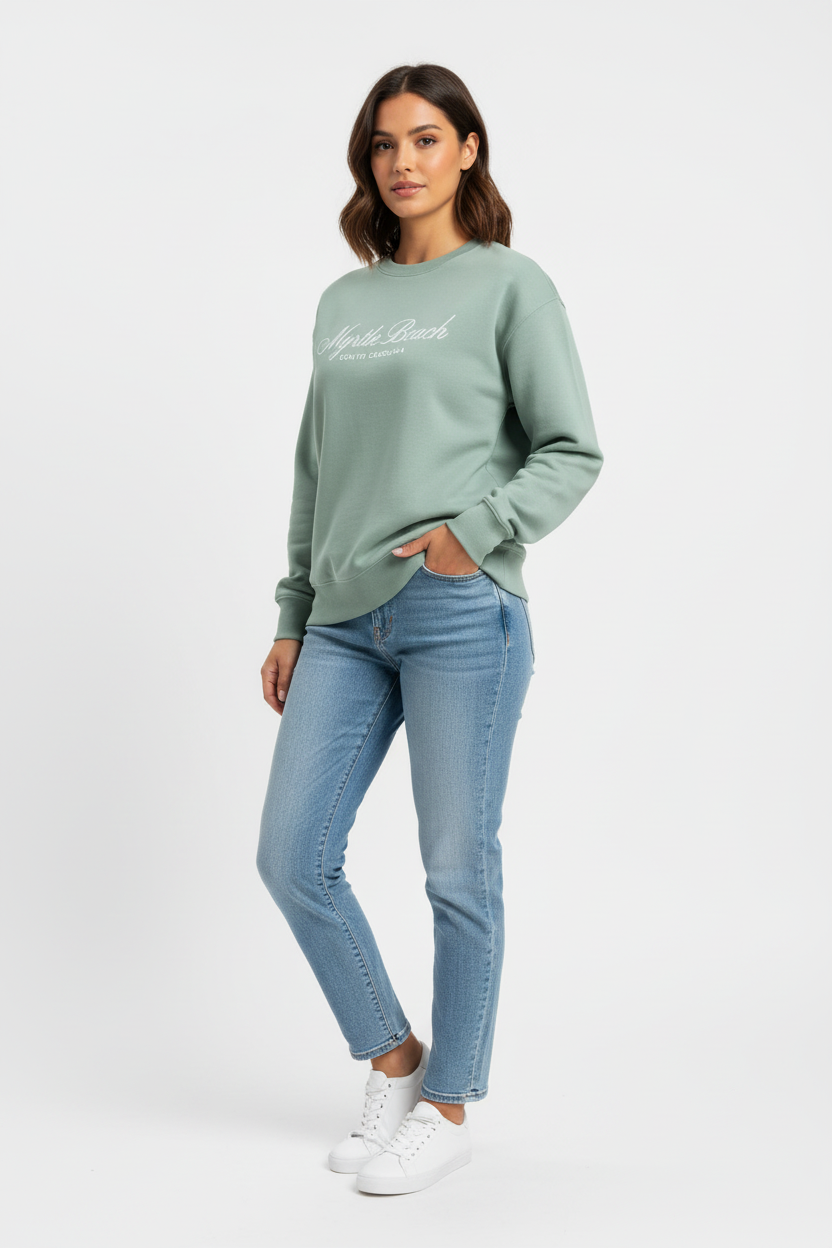 Latina model in sage crewneck front-left view