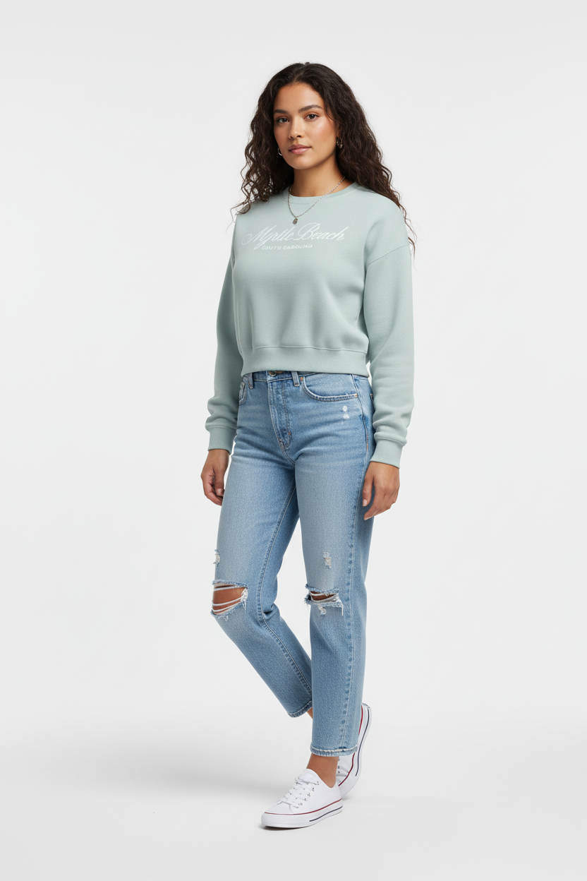Latina model in sage cropped crewneck front-left view